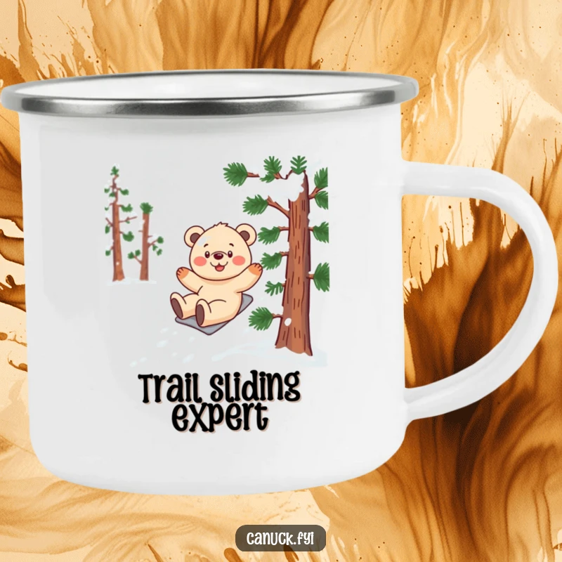 Funny bear cub enamel camping mug featuring a smiling cub gleefully sliding down a snow-covered pine tree.