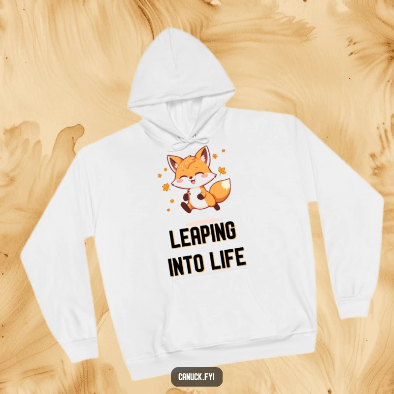 Funny Fox Hoodie showing a playful fox doing a joyful leap, decorated with tiny maple leaves, perfect for staying warm with autumnal charm.