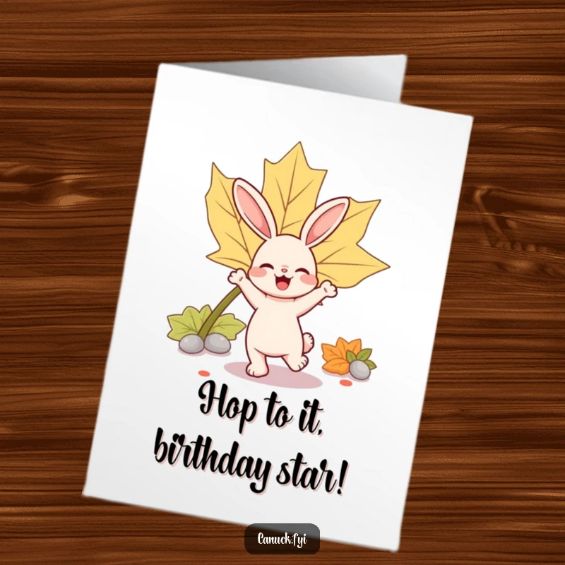 Funny free printable birthday card of a bouncy rabbit happily dancing near a large maple leaf, full of birthday energy.